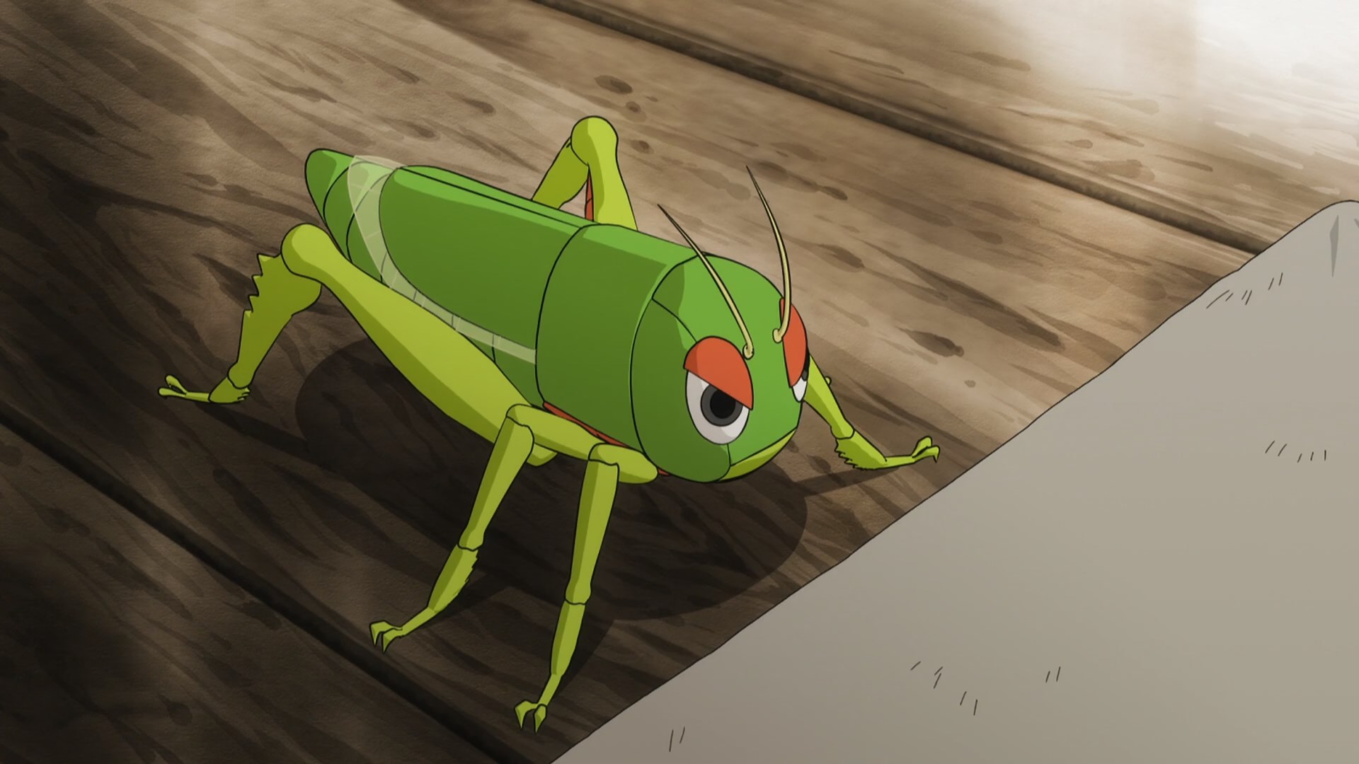 A summoned, bright green grasshopper, with cartoony eyes
